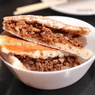 Marinated Pork Flatbread 腊汁肉夹馍 ($7) - the flatbread is crisp and nice. The pork has a lot of fatty/skin bits.