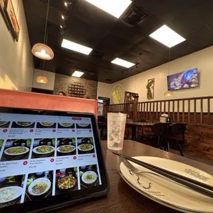 You order using a tablet.  They will bring the food to you.