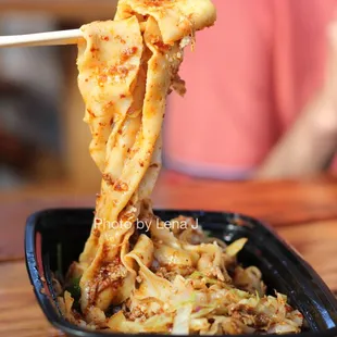 N1. Spicy Cumin Lamb Biang Noodles 孜然羊肉拌面 with Chopped Garlic ($14.49) - it&apos;s ok; pretty oily. Lamb pieces very small.