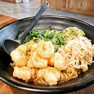 a bowl of noodles and shrimp