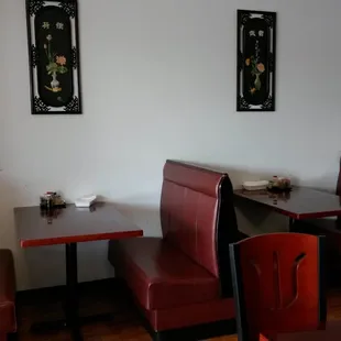 two booths and a table in a restaurant