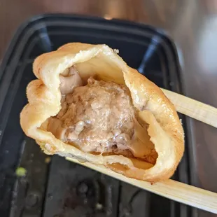 Inside of sheng jian bao-- lots of the soup already leaked out