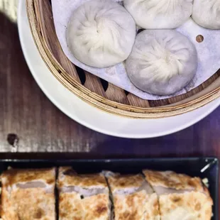 DELICIOUS pork soup dumplings! Huge!!! And my favorite beef scallion pancake roll