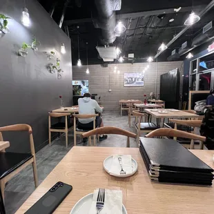 a restaurant with tables and chairs