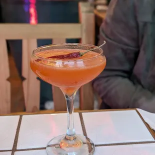 Nena Grosera ($15) - 3.5 stars. Loved the spicy chile pasilla liqueur, but Aperol tasted stronger as I had more. Fri dinner 2024-02-09