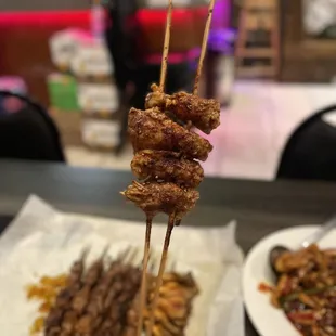 ig: @whatsviveating  |  pork belly and enoki mushroom skewer