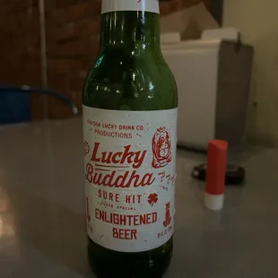 a bottle of lucky buddha