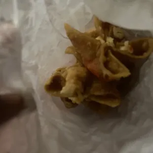 a piece of food in a wrapper