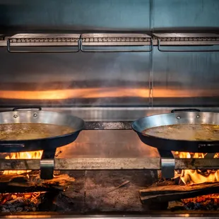 Signature Valencian Paella created to order in Xiquet's wood-fire kitchen