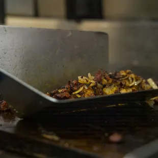 a frying pan full of food