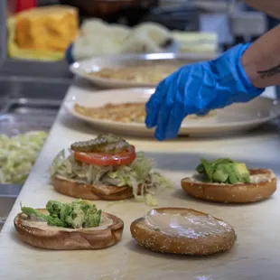 a chef preparing a sandwich