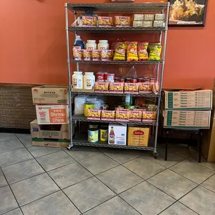 a shelf of food in a restaurant