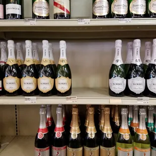bottles of champagne on a shelf