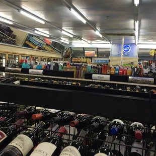 rows of wine bottles in a store