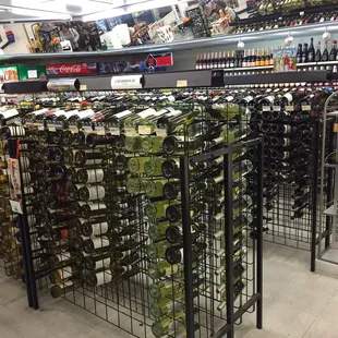 rows of wine bottles in a store