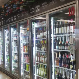 a row of beer coolers