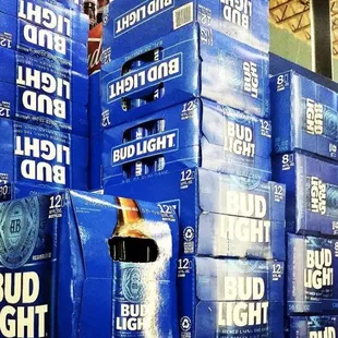a stack of bud light beer bottles