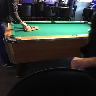 a man playing pool