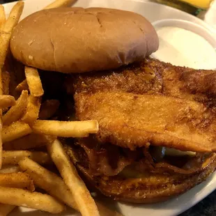 Fried chicken sandwich with spicy mayo, pickles, onion, and I added bacon - it was awesome.