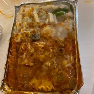 145. Baked Seafood and Pork Chop with Cheese over Rice in Casserole