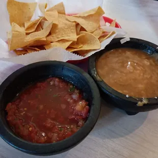 Chips, salsa and gravy with cheese