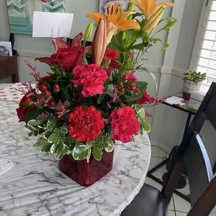 Upgraded bouquet with a nice variety of flowers.