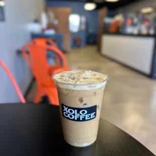 a cup of coffee on a table