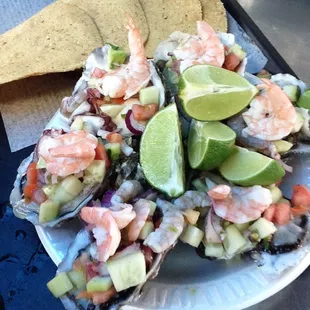 a platter of seafood and chips