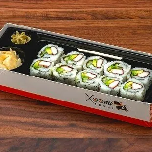 a box of sushi with chopsticks