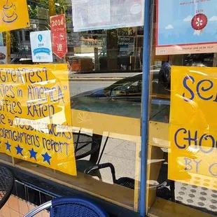 Another sign on the front window