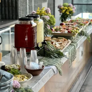 L2 grazing table with drink bar and floral