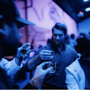 a man holding a glass of wine