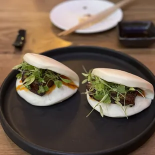 Pork belly bao buns, ordered twice.