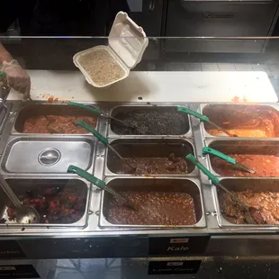 a buffet with a variety of food items