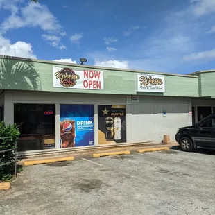 Outside, small parking lot shared with other businesses