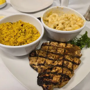 Chicken breast with yellow rice and mac n cheese