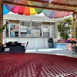 Outdoor tables only, walk-up window. Food took less than 10 minutes.