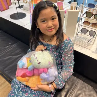 My daughter with her prizes.