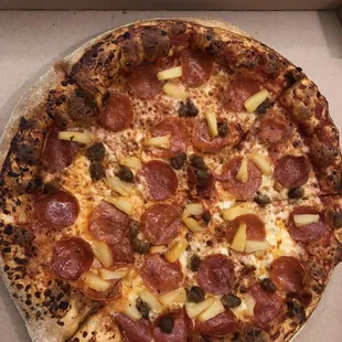 a pepperoni pizza in a box
