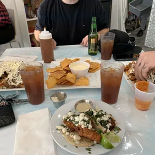 Queso and Chips, Nachos, Fried Grouper Taco and Barbacoa Taco- both Tijuana style with queso fresco- YUM!