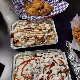 Wings, loaded fries, plate