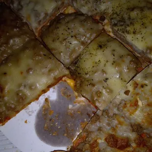 Left over pizza. Too tough no one wanted.