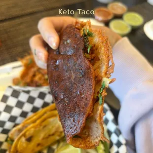 Keto Taco: tortilla of cheese, al pastor, onions + cilantro