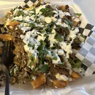 a plate of food with a fork