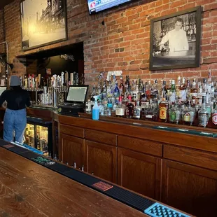 a man standing at the bar
