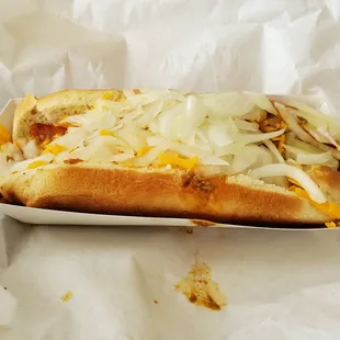 Chili dog with cheese and onions