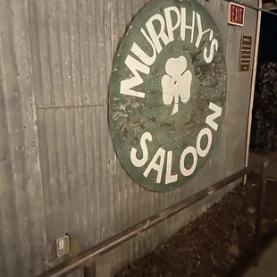 the sign for murphy&apos;s saloon