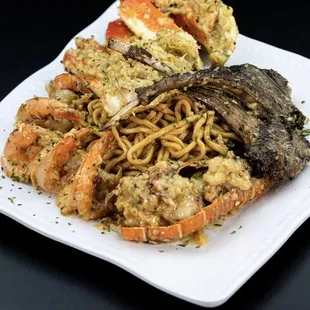 a plate of seafood and noodles