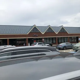 cars parked in front of the restaurant