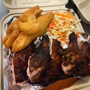 a tray of meat and fries